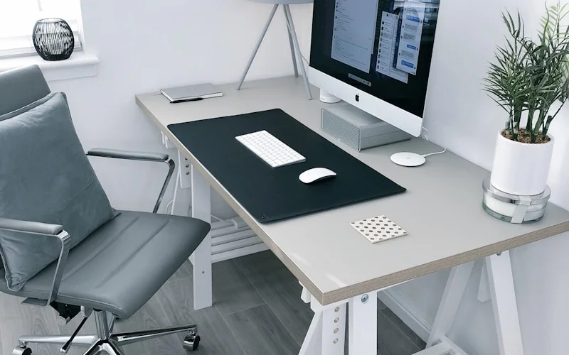 Ergonomic office chair setup for pregnant woman with proper lumbar support and seat depth adjustment