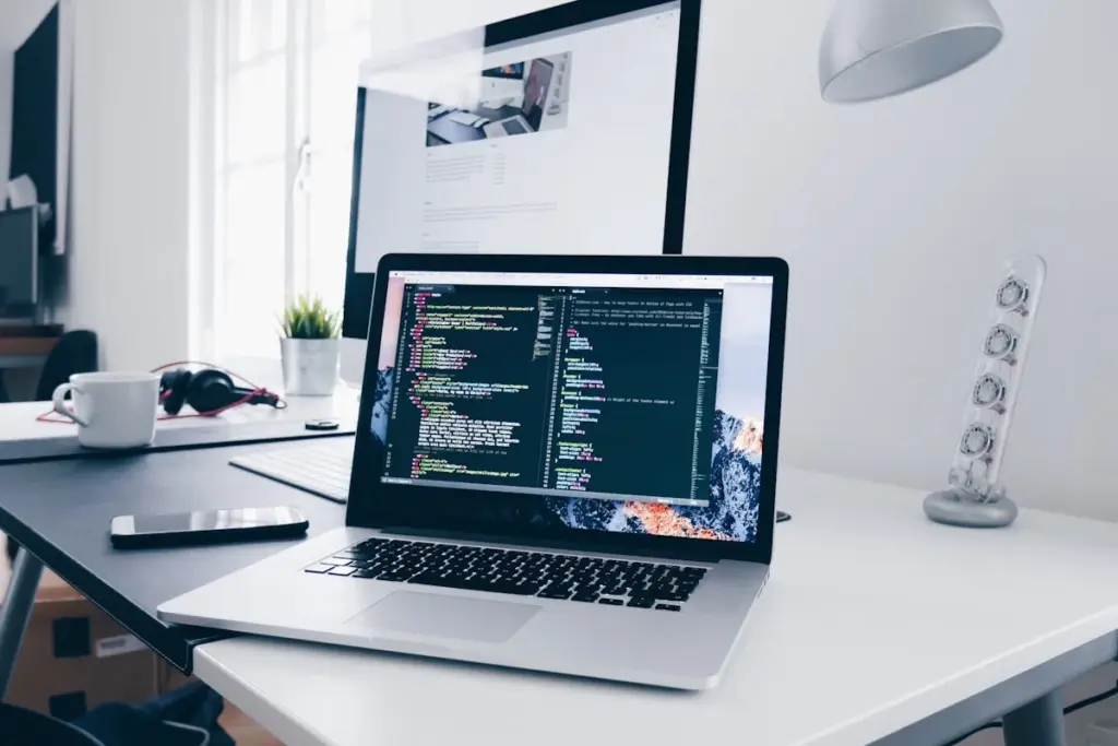 Person using ergonomic keyboard and mouse setup